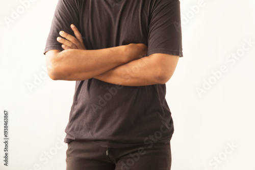 Person Standing with Arms Folded Isolated Background