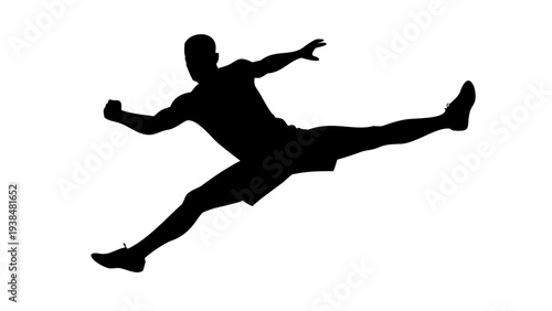Action Silhouette of Man Performing Martial Arts Jumping Side Kick