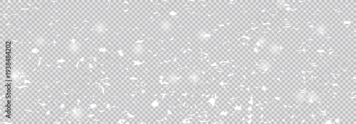 Freeze motion of natural snow falling on transparent background. Falling down real snowflakes