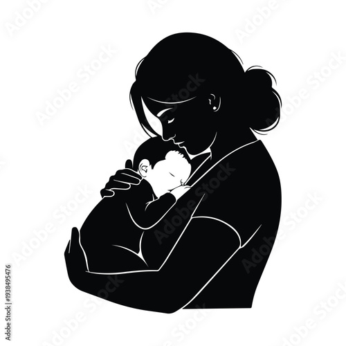 Mother tenderly holding and kissing sleeping baby