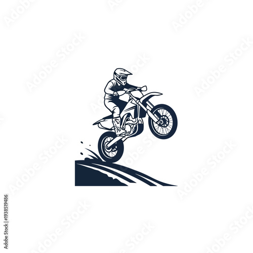 Motocross Rider in Mid Air Performing a Jump on a Dirt Track.