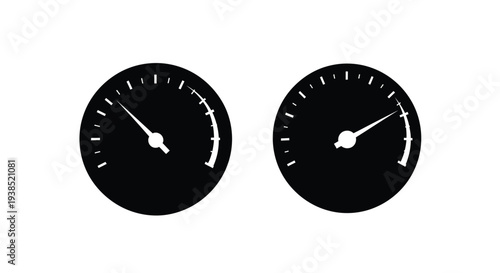 Two black gauges displaying different readings a stark silhouette