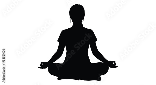 Woman meditating in lotus position a striking black silhouette