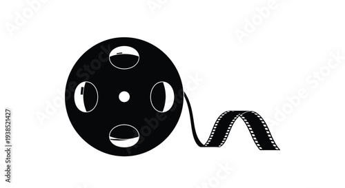 Black film reel with trailing strip a stark graphic silhouette