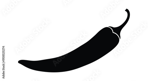 A single black chili pepper presented in a dark silhouette