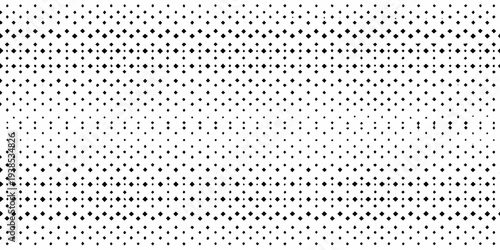 Dense arrangement of small dark diamond shapes across a white background