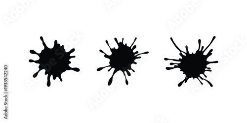 Three black ink splatters on a white background