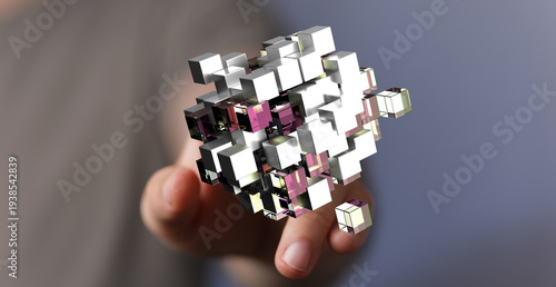 Abstract 3D cube held in a ...