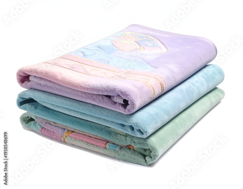 Stacked pastel soft blankets with a cartoon character design