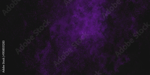 Freeze motion explosion of purple powder dust on a black background. abstract background with a textured gradient effect, suitable for wallpapers or graphic designs. Purple Smoke Cloudscape Texture.