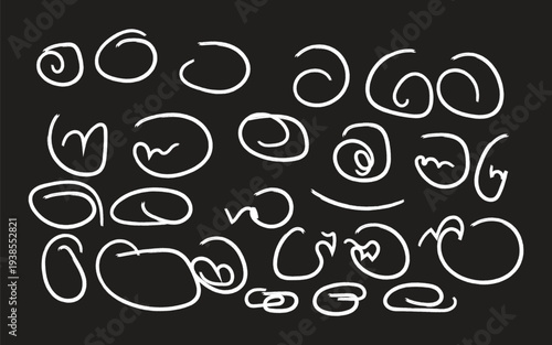 Collection of white squiggly lines on black background