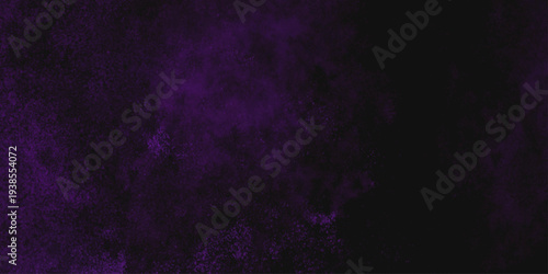Freeze motion explosion of purple powder dust on a black background. abstract background with a textured gradient effect, suitable for wallpapers or graphic designs. Purple Smoke Cloudscape Texture.