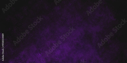 Freeze motion explosion of purple powder dust on a black background. abstract background with a textured gradient effect, suitable for wallpapers or graphic designs. Purple Smoke Cloudscape Texture.