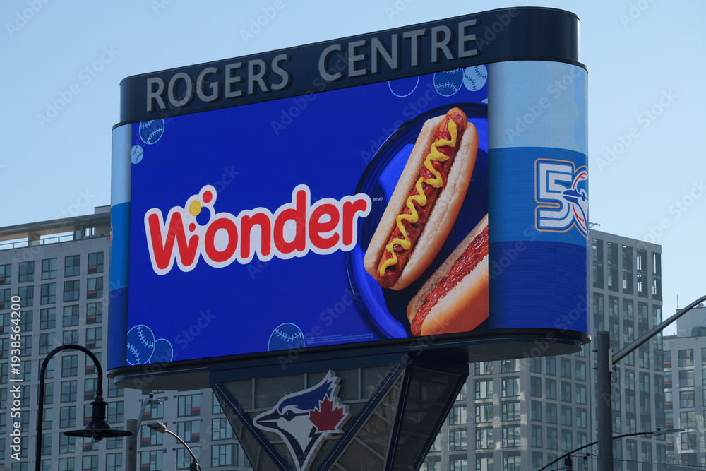 Fototapeta premium advertising for Wonder (bread) on digital billboard at Rogers Centre Gardiner pylon, Bremner Blvd near Rees St, Toronto