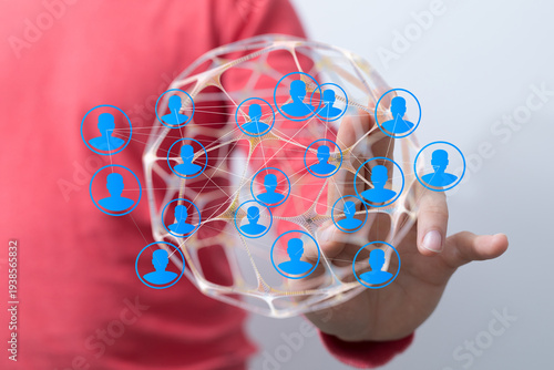 Person holding a sphere of ...