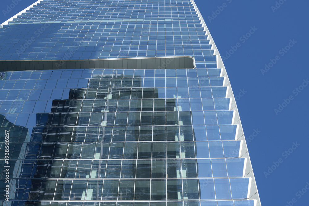 Obraz premium oblique angle view of TD Terrace, a corporate office, located at 160 Front St W (designed by Adrian Smith + Gordon Gill Architecture) Simcoe St side, Toronto