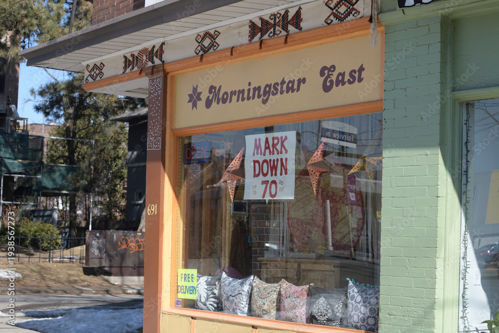 Fototapeta premium exterior facade shop window and signs outside Morningstar East, a furniture store, located at 691 Broadview Av, Toronto