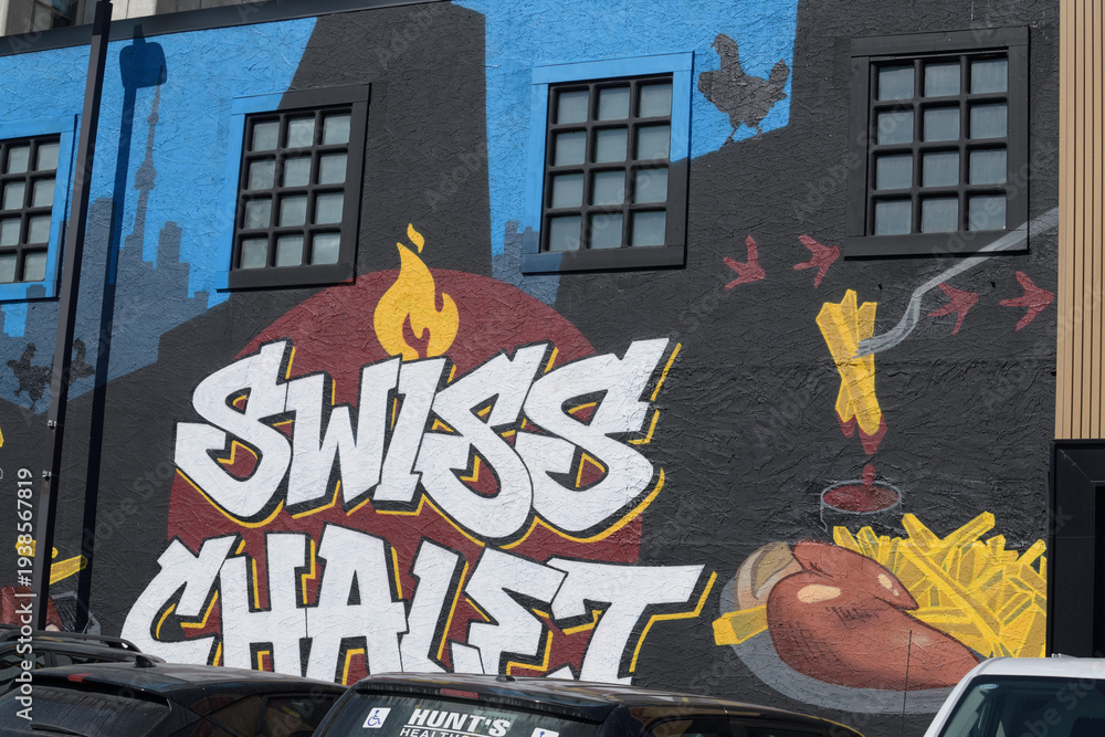 Naklejka premium graffiti inspired mural on the exterior wall of Swiss Chalet Express, a restaurant chain, located here at 722 Pape Av, Toronto
