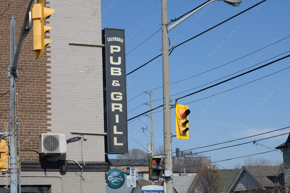 Naklejka premium wall mounted projecting sign outside California Pub & Grill (California Restaurant & Bar), located at 914 Pape Av, East York, Toronto