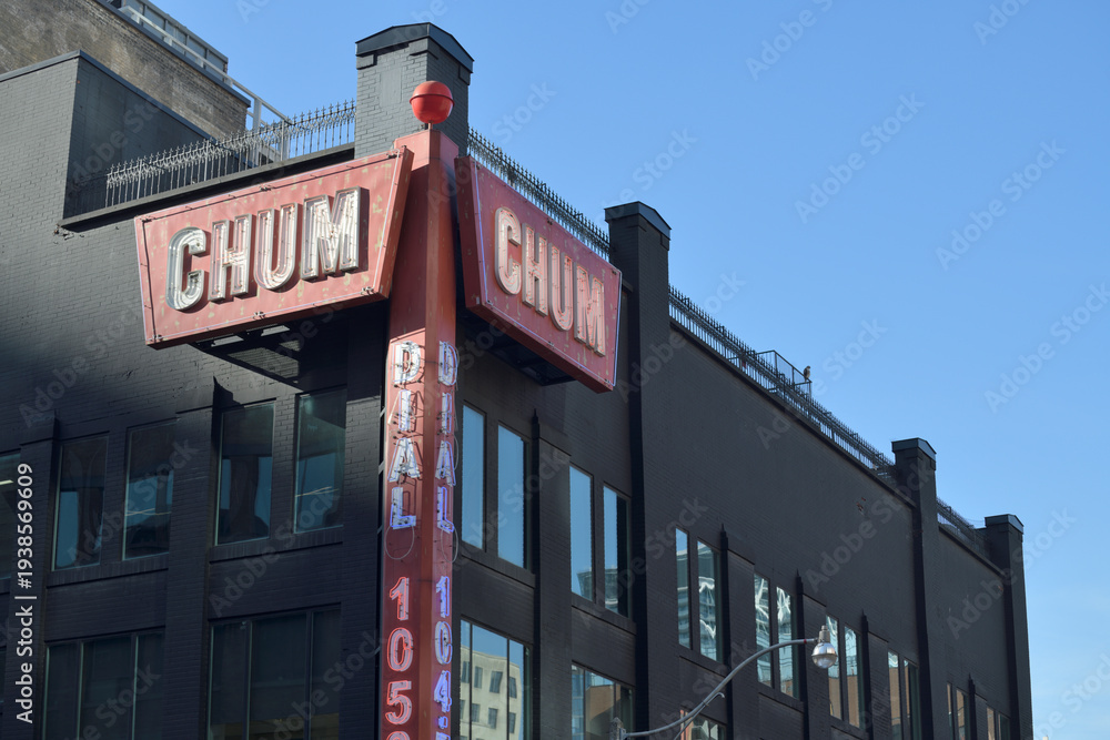 Fototapeta premium vintage neon sign outside CHUM 104.5, a radio broadcaster, at 299 Queen St W - actual sign at corner of Richmond and Duncan, Toronto