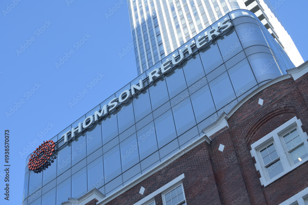 Fototapeta premium exterior building and sign of Thomson Reuters a mixed use complex located at 19 Duncan St (FORMA condo development), Toronto