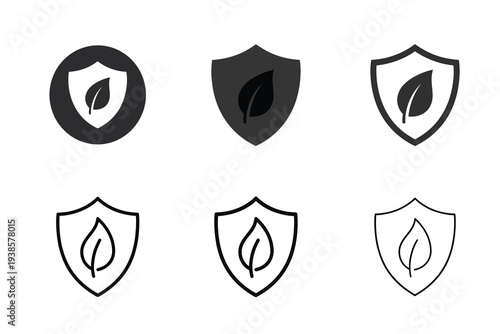 Set of six shield and crest icons with arrow and leaf designs