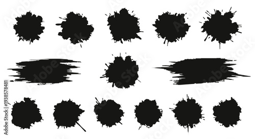 Collection of black ink splatters and brush strokes on white background