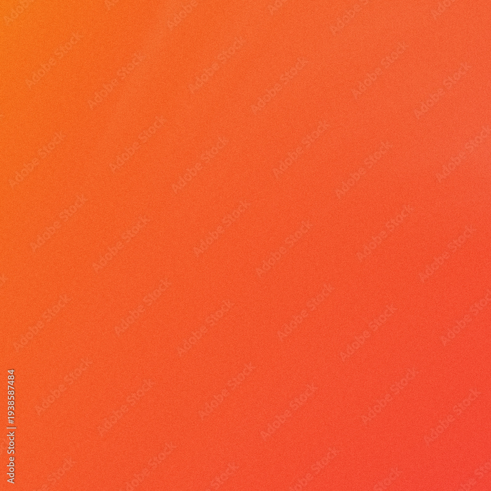 Fototapeta premium A vibrant orange gradient background with a subtle texture effect.