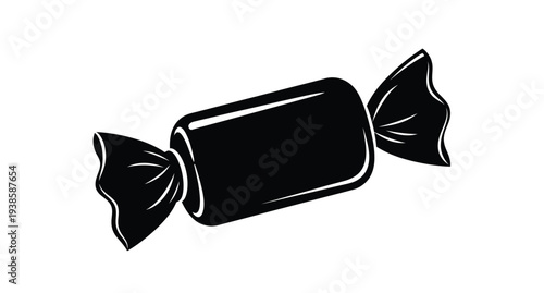Black candy wrapper with twisted ends a striking silhouette