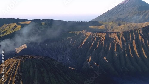 The Bromo Tengger Semeru National Park in Indonesia, with calderas, mountains, and a colorful sky