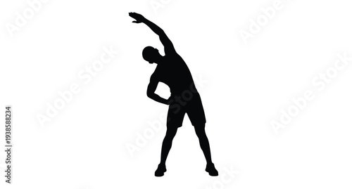 A person stretching side to side captured in a dark silhouette