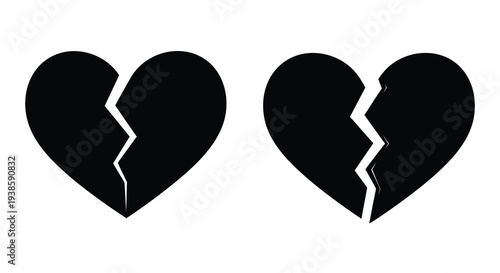 Two broken hearts displayed as a striking black silhouette