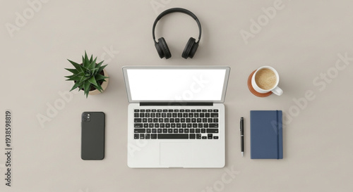 Top View of a Modern Laptop Setup with Accessories.