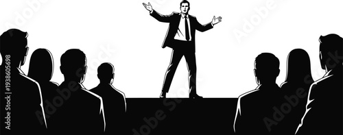 A man in a suit standing on a stage giving a presentation to an audience