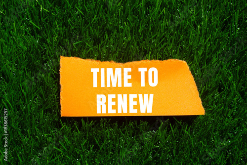 Bild auf Leinwand Time to renew message written on ripped torn paper background