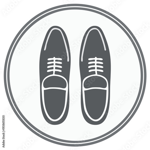 Icon of mens leather dress shoes in a circular frame.