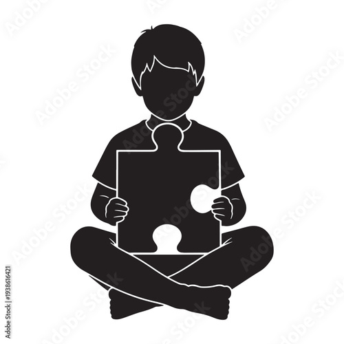 A silhouette of a boy sitting cross-legged holding a puzzle piece