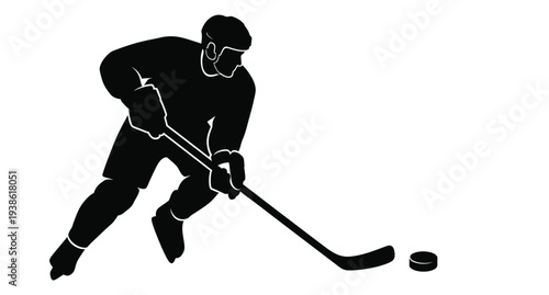 Hockey player in action dynamically skating with puck and stick silhouette