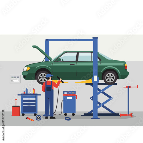 A car mechanic in blue overalls and a cap working on a green sedan elevated on a hydraulic lift in a well-equipped auto repair garage.