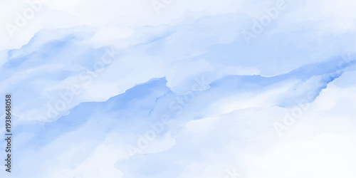A beautiful view of fluffy white clouds in a bright clear blue sky on a sunny summer day creates a peaceful nature background with a light atmosphere