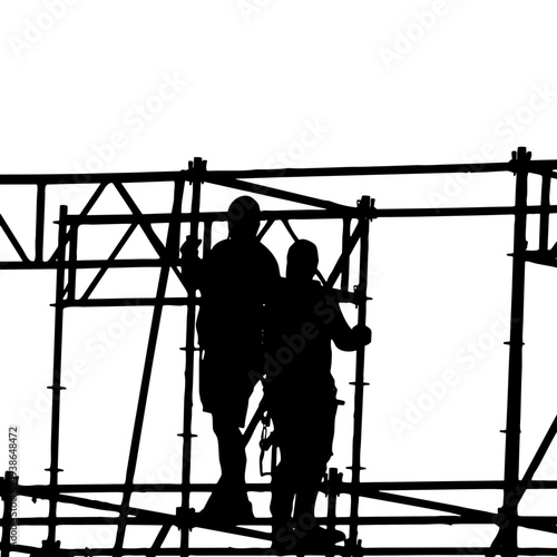 Obreros trabajando sobre andamios