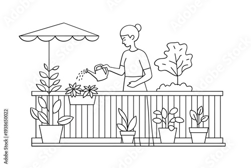 Woman watering plants on a balcony with a parasol overhead