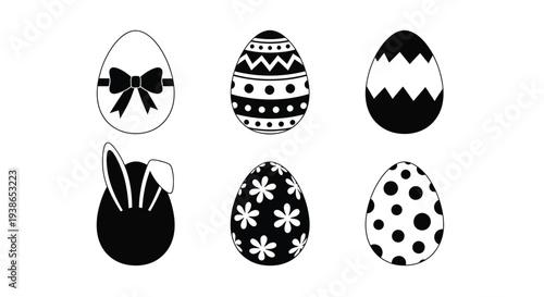 Six decorated Easter eggs show black and white patterns.