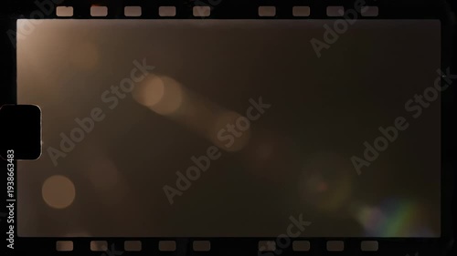 Cinematic Lens Flare Effect with Bokeh and Film Grain Texture Overlays for Video Editing