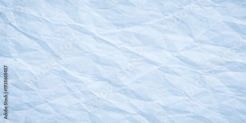 Crumpled blue paper texture background with wrinkled and creased surface