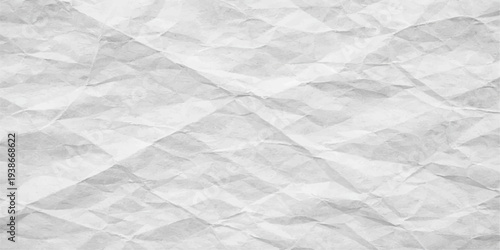 White crumpled paper texture background with wrinkled rough surface and creased sheet pattern