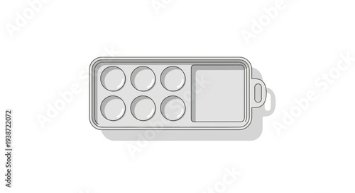 Top view of a baking pan with six muffin cups and a square section