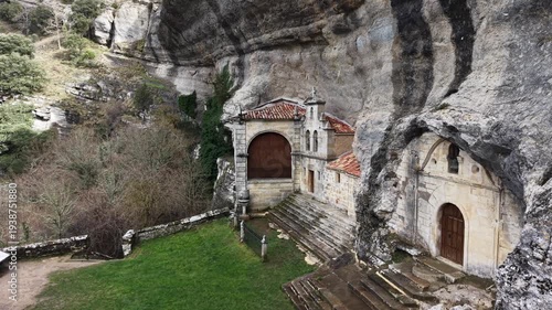 Ojo guareña hermitage built into rock cliff