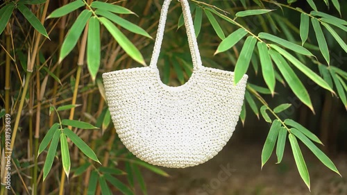 Natural Woven Bag Swaying in Bamboo Garden