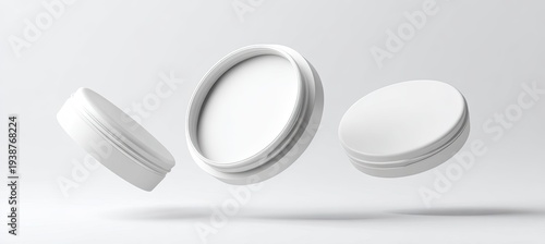 Three white, open and closed containers levitate against a white background